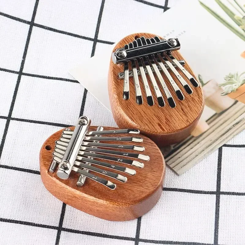 1Pcs Wood Mini Thumb Piano Mus - огляд і ціна Kalimba Thumb Piano